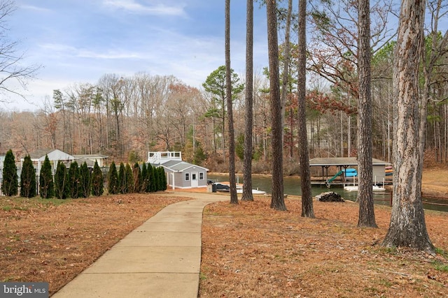 11104 Piney Forest Rd, Bumpass, VA 23024 - view of home's community featuring a water view, an outdoor structure, and a wooded view