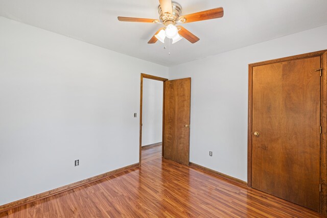 57 Greenbriar Ln, Stuarts Draft, VA 24477 - unfurnished bedroom featuring wood finished floors and a ceiling fan