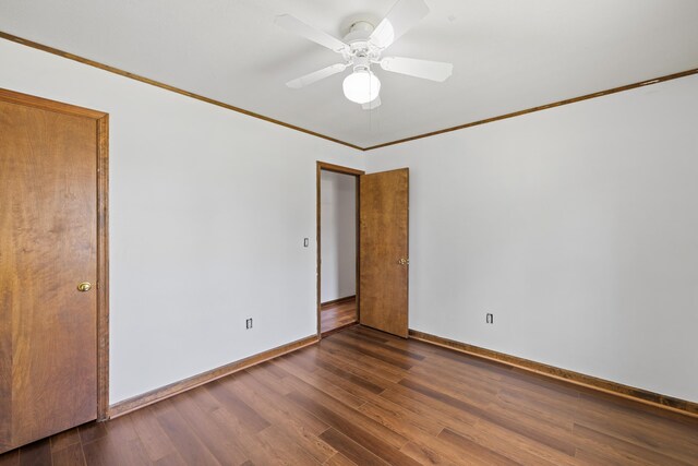 57 Greenbriar Ln, Stuarts Draft, VA 24477 - unfurnished bedroom with dark wood finished floors, crown molding, and a ceiling fan