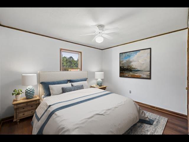57 Greenbriar Ln, Stuarts Draft, VA 24477 - bedroom with wood finished floors and a ceiling fan