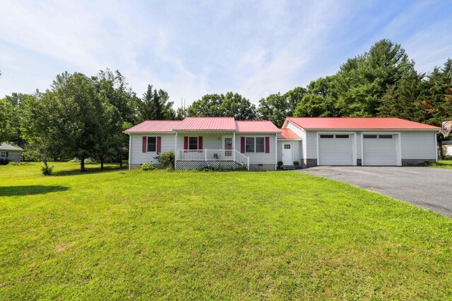 57 Greenbriar Ln, Stuarts Draft, VA 24477 - single story home with covered porch, a front lawn, a metal roof, and asphalt driveway
