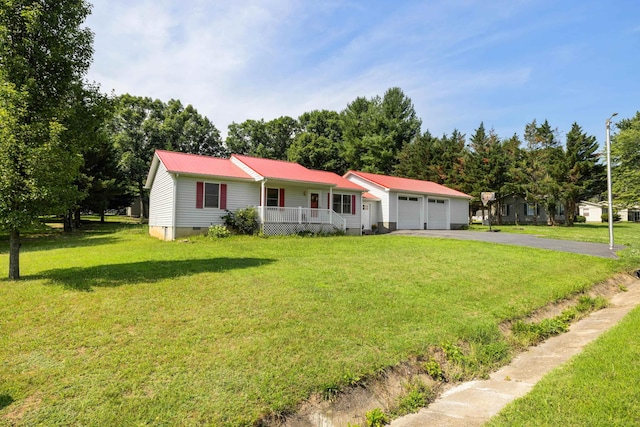 57 Greenbriar Ln, Stuarts Draft, VA 24477 - ranch-style house featuring covered porch, an attached garage, driveway, and a front lawn