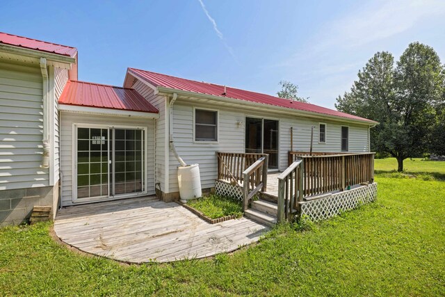 57 Greenbriar Ln, Stuarts Draft, VA 24477 - back of house featuring a deck, a yard, and a metal roof