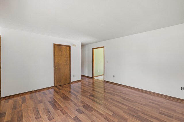 57 Greenbriar Ln, Stuarts Draft, VA 24477 - empty room featuring wood finished floors and baseboards