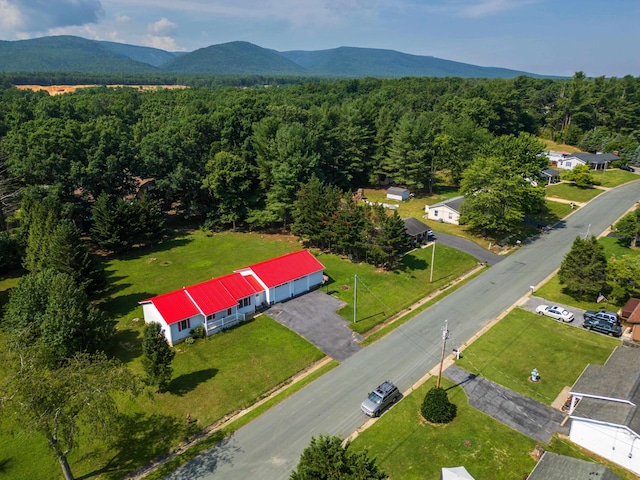 57 Greenbriar Ln, Stuarts Draft, VA 24477 - drone / aerial view of a heavily wooded area and a mountainous background