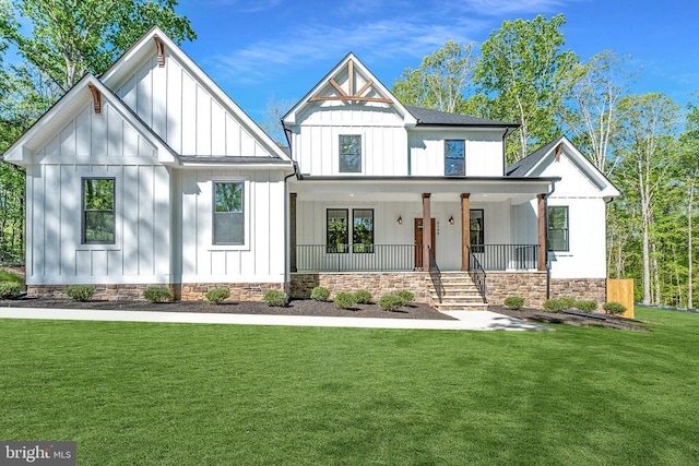 Buckners Ln Lot 8, Mineral, VA 23117 - modern farmhouse style home featuring board and batten siding, a porch, and a front yard