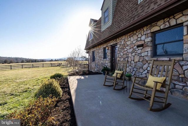 view of patio / terrace featuring a view of countryside