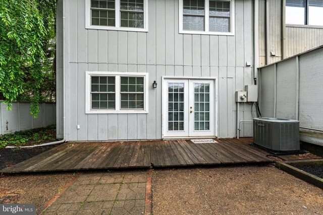 133 Woodlake Dr, Charlottesville, VA 22901 - rear view of property featuring central AC, french doors, a deck, and board and batten siding