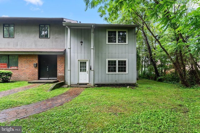 133 Woodlake Dr, Charlottesville, VA 22901 - rear view of house featuring a lawn and brick siding