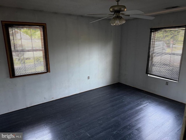 231 Derby Ln, Louisa, VA 23093 - empty room with a ceiling fan and dark wood finished floors