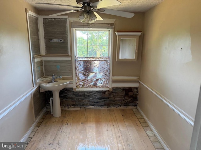 231 Derby Ln, Louisa, VA 23093 - bathroom with ceiling fan and wood-type flooring