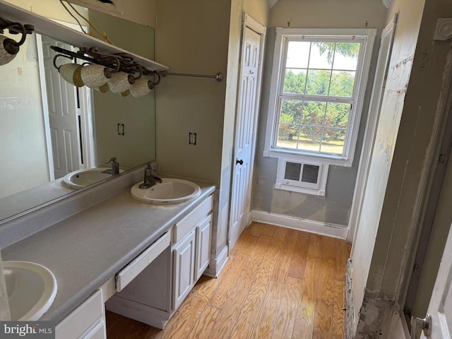231 Derby Ln, Louisa, VA 23093 - bathroom featuring wood finished floors and double vanity