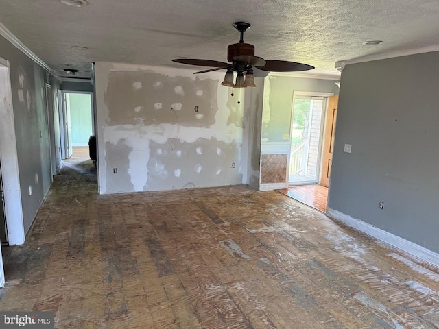 231 Derby Ln, Louisa, VA 23093 - spare room with crown molding, ceiling fan, and wood finished floors