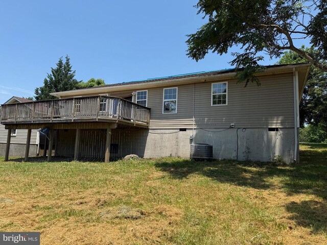 231 Derby Ln, Louisa, VA 23093 - back of property featuring a deck, a lawn, and crawl space