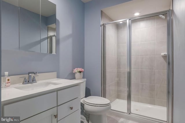 11316 Oakville Ln, Spotsylvania, VA 22551 - bathroom featuring a shower stall, toilet, and vanity