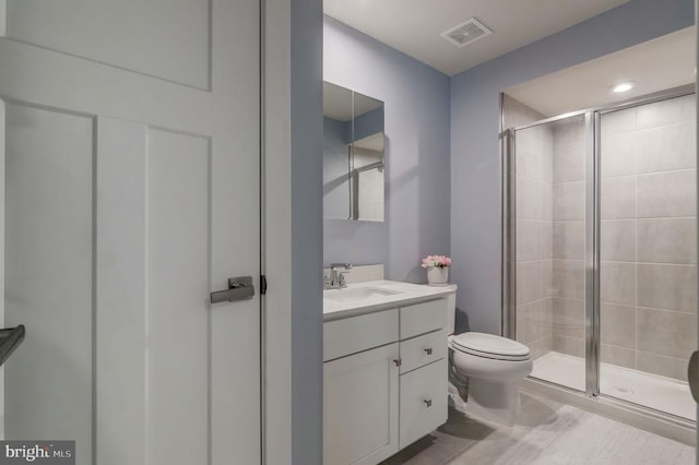 11316 Oakville Ln, Spotsylvania, VA 22551 - full bathroom featuring a shower stall, toilet, and vanity