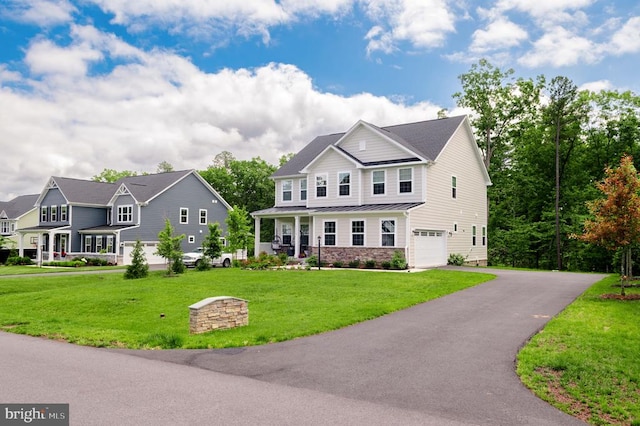 11316 Oakville Ln, Spotsylvania, VA 22551 - craftsman house featuring a standing seam roof, a garage, asphalt driveway, metal roof, and a front lawn