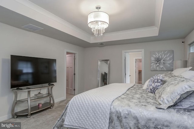 11316 Oakville Ln, Spotsylvania, VA 22551 - carpeted bedroom with a tray ceiling, a chandelier, baseboards, and ornamental molding
