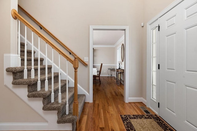 15 Devonshire Ct, Fishersville, VA 22939 - entryway featuring wood finished floors, stairs, crown molding, and plenty of natural light