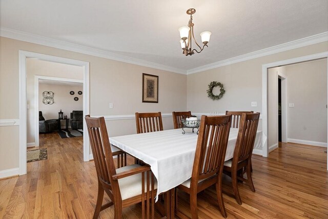 15 Devonshire Ct, Fishersville, VA 22939 - dining room with a chandelier, light wood-type flooring, ornamental molding, and baseboards