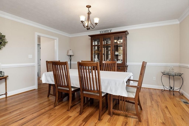 15 Devonshire Ct, Fishersville, VA 22939 - dining room featuring a chandelier, light wood finished floors, ornamental molding, and baseboards