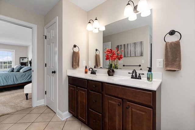 15 Devonshire Ct, Fishersville, VA 22939 - ensuite bathroom featuring tile patterned floors, double vanity, and baseboards