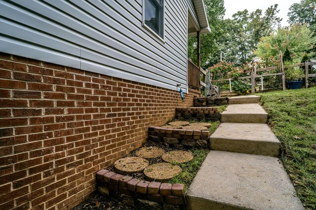 1033 Bridle Ct, Harrisonburg, VA 22801 - view of home's exterior with fence and brick siding