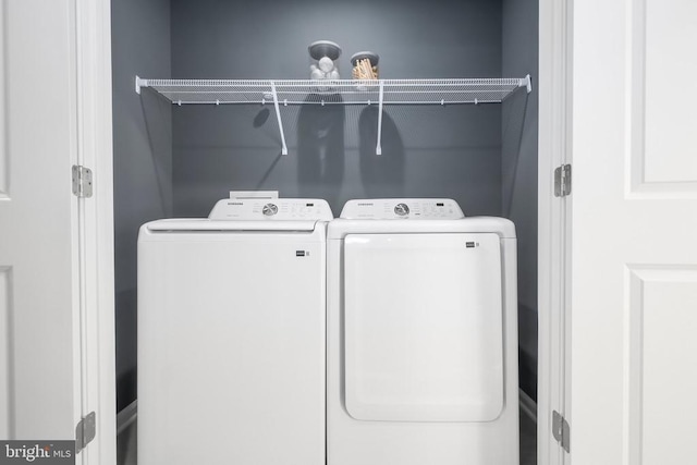 7713 Harlow Cir, Spotsylvania, VA 22551 - clothes washing area with washing machine and dryer