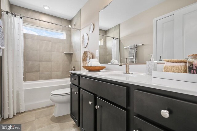 7713 Harlow Cir, Spotsylvania, VA 22551 - full bath with toilet, shower / bathtub combination with curtain, vanity, and tile patterned floors