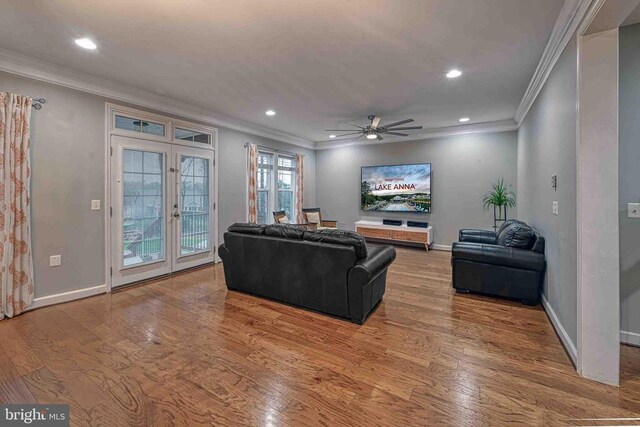 299 Sunset Loop, Mineral, VA 23117 - living room with ornamental molding, wood finished floors, baseboards, french doors, and a ceiling fan