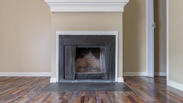 822 Meadowlark Dr, Harrisonburg, VA 22850 - detailed view of wood finished floors, a fireplace with flush hearth, and baseboards