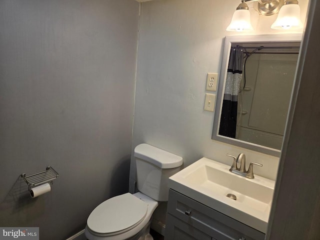  - bathroom with vanity and a shower with shower curtain