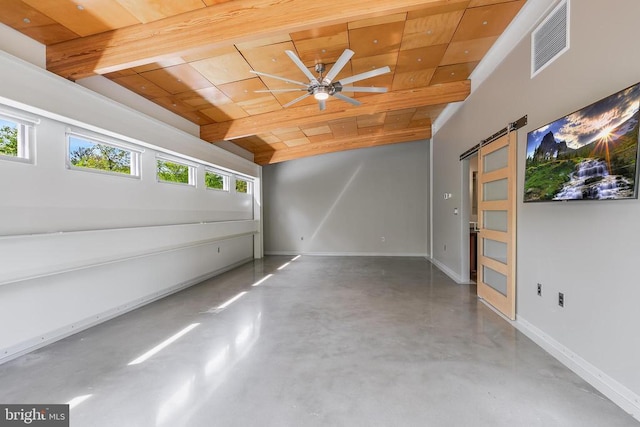 unfurnished room with wood ceiling, finished concrete flooring, a ceiling fan, visible vents, and a barn door