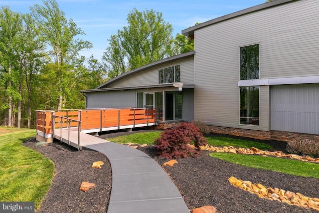  - exterior space featuring a wooden deck