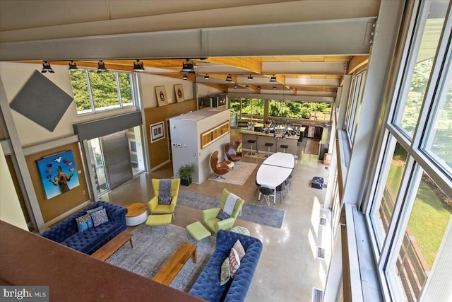  - living room with beamed ceiling