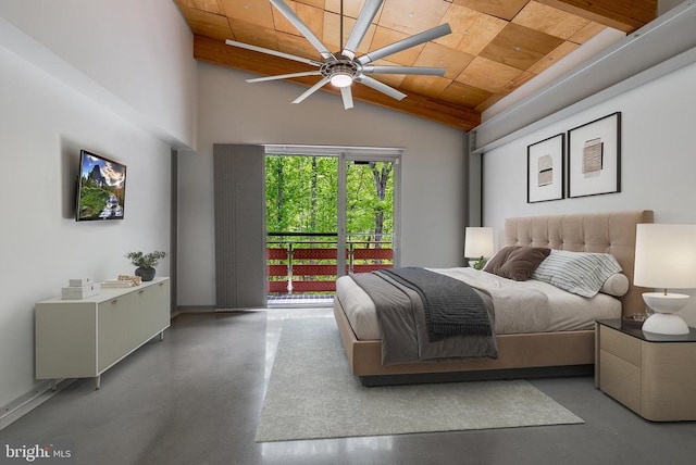 bedroom with finished concrete floors, wooden ceiling, and high vaulted ceiling