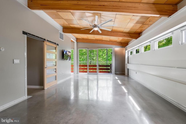 empty room featuring wood ceiling, visible vents, a barn door, ceiling fan, and lofted ceiling