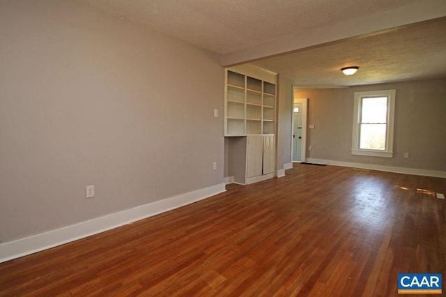 309 Port Republic Rd, Waynesboro, VA 22980 - unfurnished living room featuring baseboards, wood finished floors, and a textured ceiling