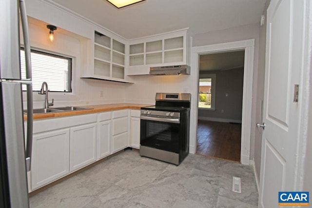 309 Port Republic Rd, Waynesboro, VA 22980 - kitchen with stainless steel appliances, under cabinet range hood, a sink, and white cabinets