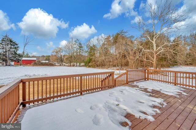 view of snow covered deck