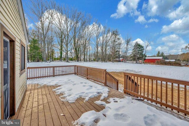 view of snow covered deck