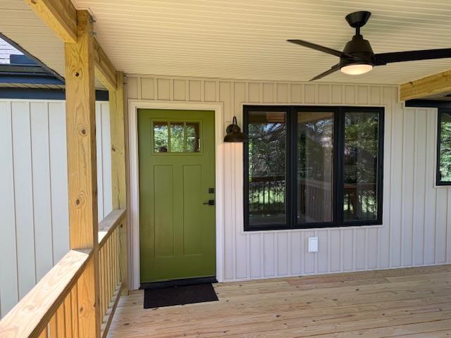 1201 Lakeshore Dr S, Louisa, VA 23093 - entrance to property featuring a ceiling fan and board and batten siding