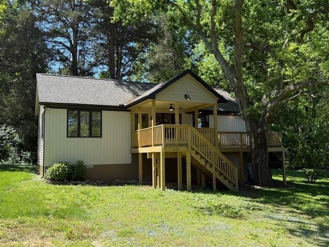 1201 Lakeshore Dr S, Louisa, VA 23093 - view of front of property with stairway, a front yard, roof with shingles, and a deck