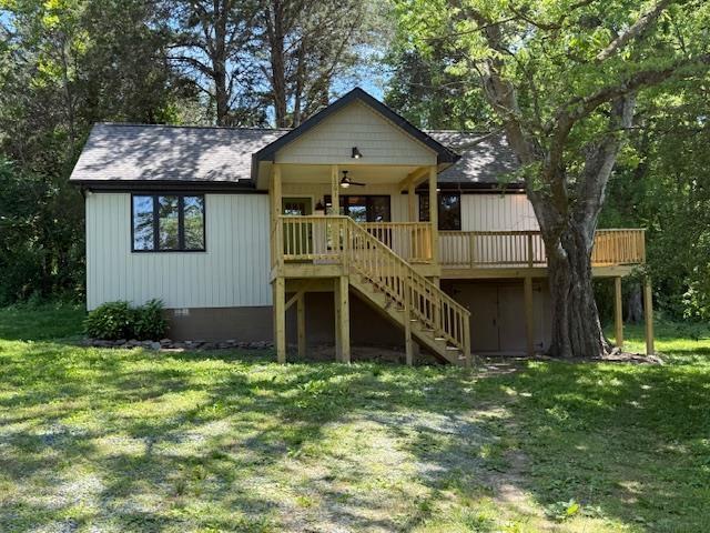1201 Lakeshore Dr S, Louisa, VA 23093 - view of front of home featuring stairs, a front lawn, a ceiling fan, a wooden deck, and crawl space