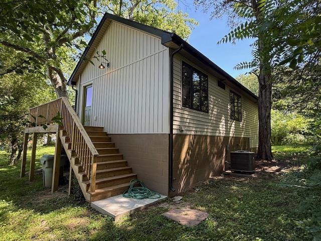 1201 Lakeshore Dr S, Louisa, VA 23093 - view of side of home featuring stairway and central AC unit