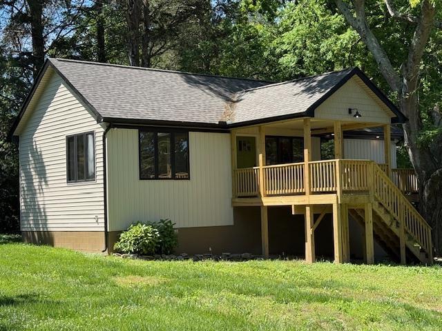 1201 Lakeshore Dr S, Louisa, VA 23093 - view of front of house with a front lawn and a shingled roof