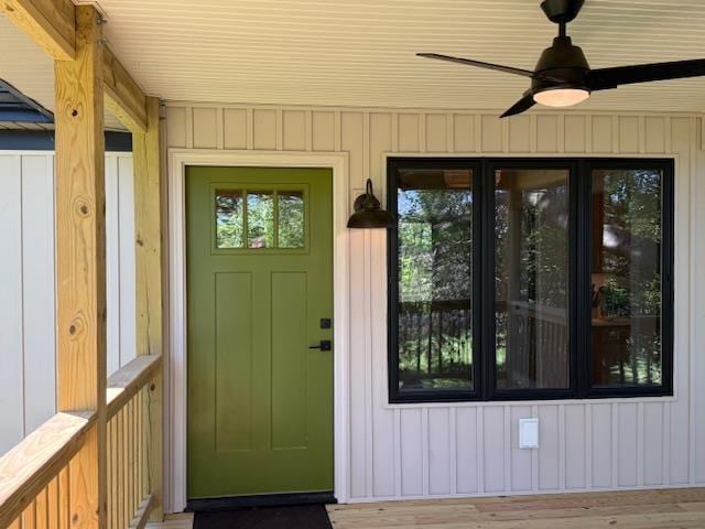 1201 Lakeshore Dr S, Louisa, VA 23093 - doorway to property with a ceiling fan and board and batten siding