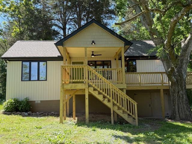1201 Lakeshore Dr S, Louisa, VA 23093 - rear view of house featuring crawl space, stairs, a yard, and ceiling fan