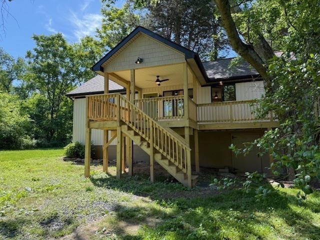 1201 Lakeshore Dr S, Louisa, VA 23093 - rear view of property featuring a ceiling fan, stairway, a yard, and a shingled roof