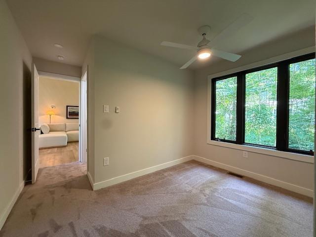 1201 Lakeshore Dr S, Louisa, VA 23093 - unfurnished room featuring carpet flooring, baseboards, and a ceiling fan